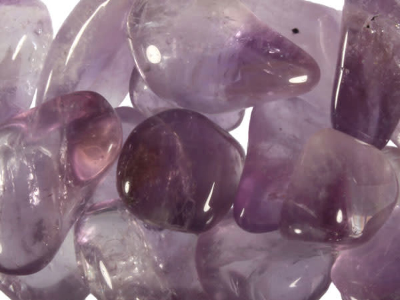 Amethist (licht) steen getrommeld 2 - 5 gram Amethist (licht) steen getrommeld 2 - 5 gram