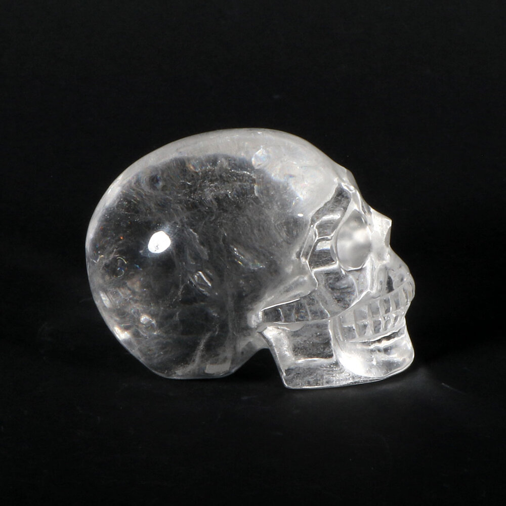 Bergkristal kristallen schedel 8 x 6,5 x 5,5 cm | 340 gram Bergkristal kristallen schedel 8 x 6,5 x 5,5 cm | 340 gram