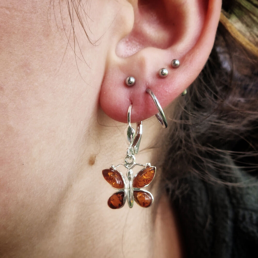 Zilveren oorbellen barnsteen | vlinder 4 stenen Zilveren oorbellen barnsteen | vlinder 4 stenen