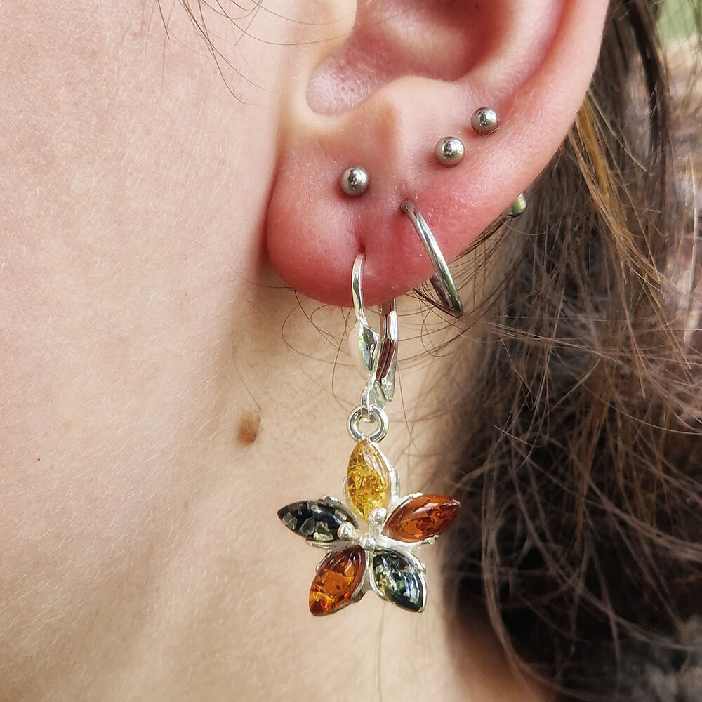 Zilveren oorbellen barnsteen | bloem 3 kleuren Zilveren oorbellen barnsteen | bloem 3 kleuren