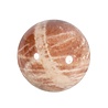 Maansteen (roze) met zonnesteen bol 54 mm | 214 gram Maansteen (roze) met zonnesteen bol 54 mm | 214 gram