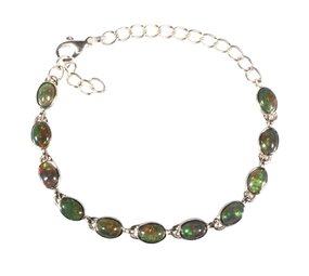 Zilveren armband opaal (zwart) | ovaal 8 x 6 mm