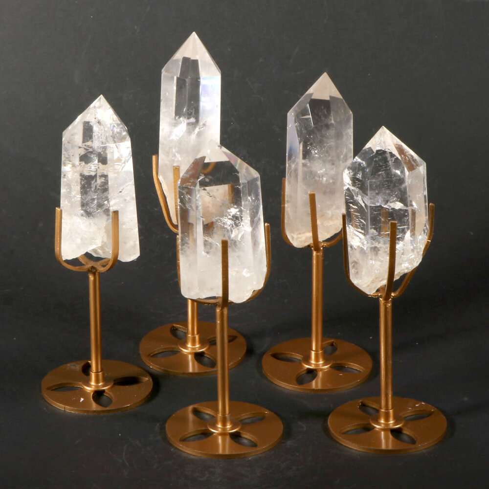 Bergkristal punt geslepen | 200 - 300 gram | op standaard Bergkristal punt geslepen | 200 - 300 gram | op standaard