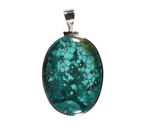 Zilveren hanger turkoois (Tibetaans) | ovaal 3,9 x 2,9 cm Zilveren hanger turkoois (Tibetaans) | ovaal 3,9 x 2,9 cm