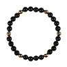 Onyx armband met 6 gouden (14k) kralen