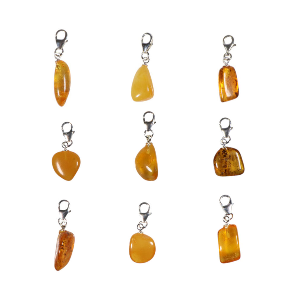 Barnsteen bedeltje met sterling zilveren slotje