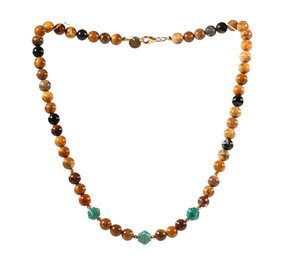 Gold filled ketting versteend palmhout met turkoois bicones