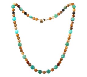 Gold filled ketting versteend palmhout met turkoois coins