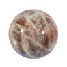 Maansteen (blauw) met zonnesteen bol 55 mm | 224 gram