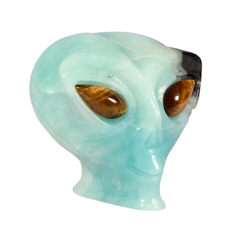 Calciet (Caribbean blue) met tijgeroog ogen alien schedel 8,7 x 6,9 x 6,8 cm | 414 gram Calciet (Caribbean blue) met tijgeroog ogen alien schedel 8,7 x 6,9 x 6,8 cm | 414 gram