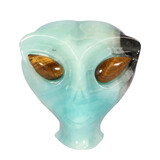 Calciet (Caribbean blue) met tijgeroog ogen alien schedel 8,7 x 6,9 x 6,8 cm | 414 gram Calciet (Caribbean blue) met tijgeroog ogen alien schedel 8,7 x 6,9 x 6,8 cm | 414 gram