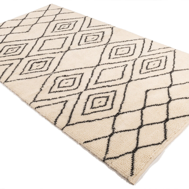 Reva 12 - Luxuriöser hochfloriger Wollteppich in Beige mit symmetrischem Muster