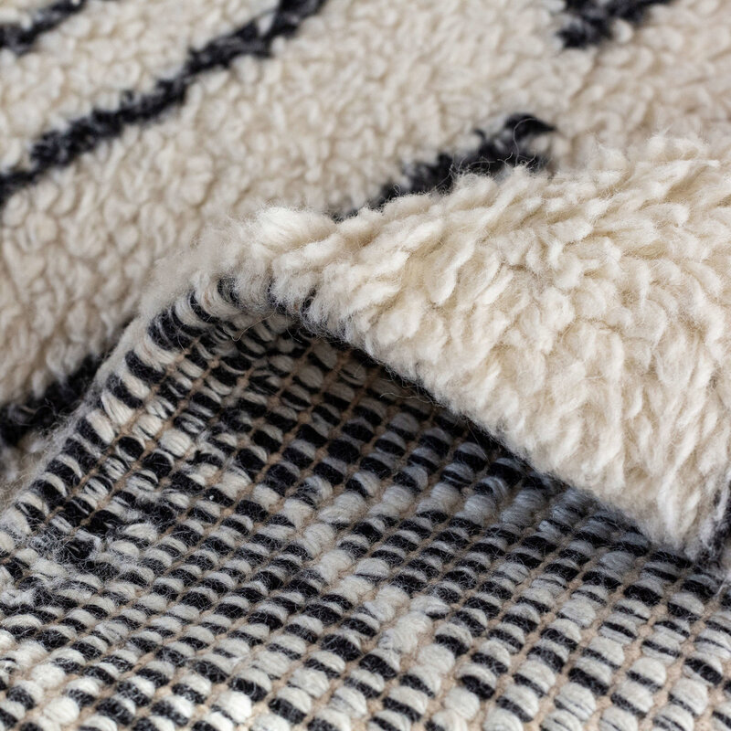 Reva 12 - Luxuriöser hochfloriger Wollteppich in Beige mit symmetrischem Muster