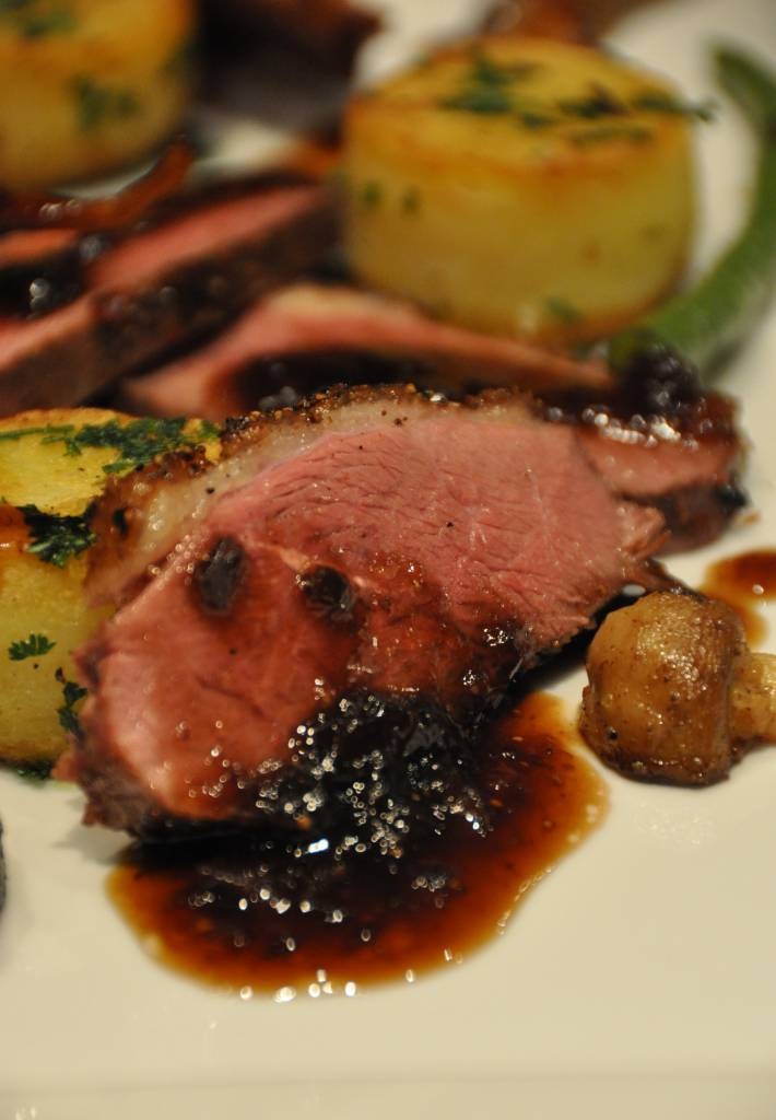 Duck breast fillet with parsley potatoes, mushrooms, beans and sauce with fig jam