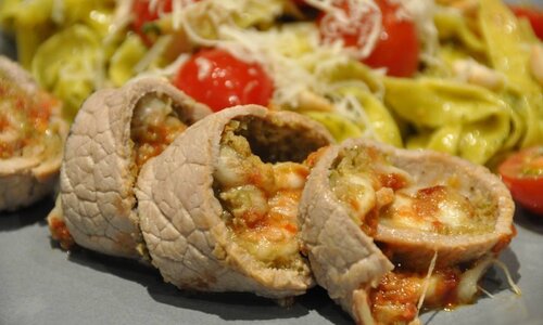 Italian veal rolls with pasta, pesto and cherry tomato