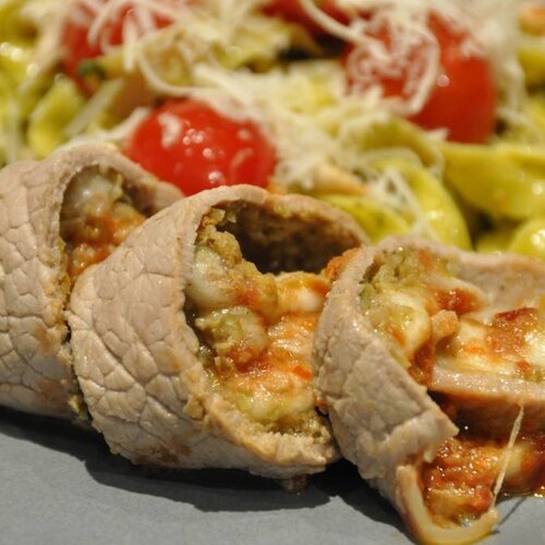 Italian veal rolls with pasta, pesto and cherry tomato