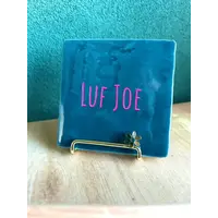 Gold stand with little flower for quote tile