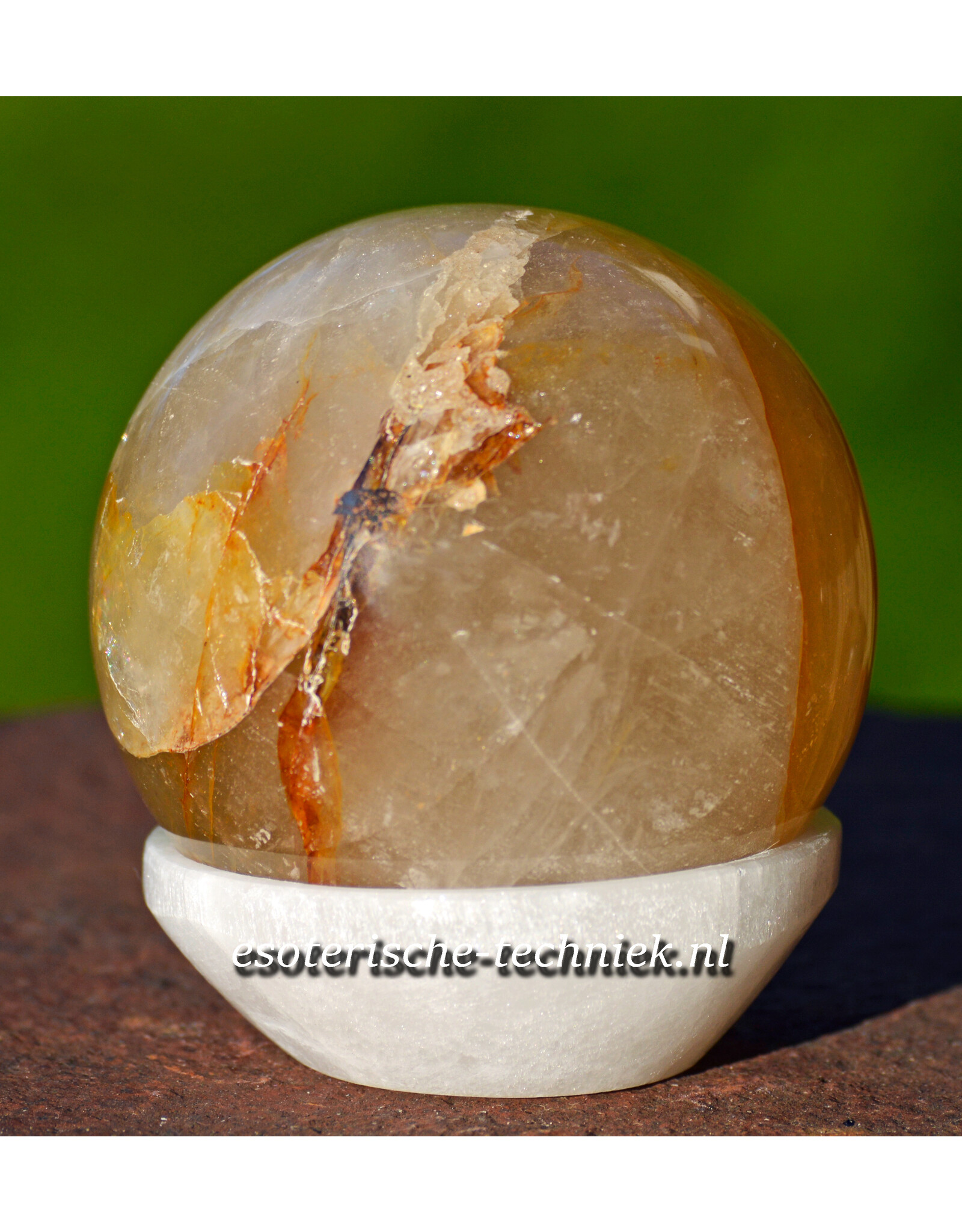 Edelsteen bol of Sphere Golden Healer met seleniet schaaltje