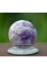 Edelsteen bol of sphere Amethist met bergkristal donut.