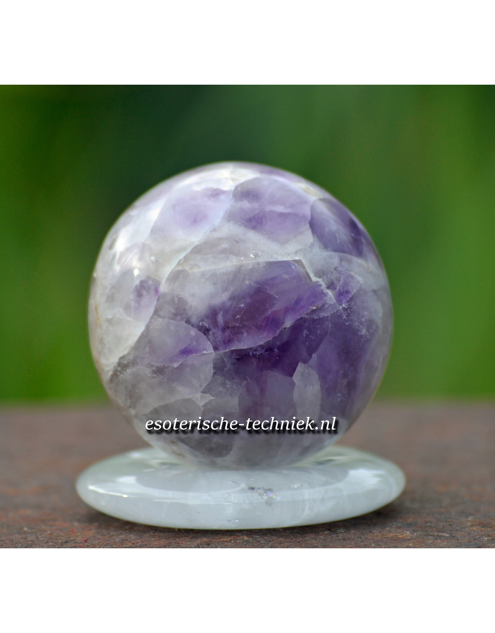 Edelsteen bol of sphere Amethist met bergkristal donut.