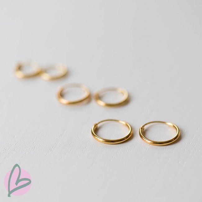 KARMA Paar goud creool oorbellen