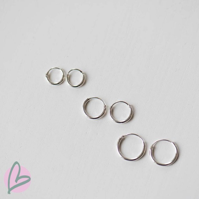 KARMA zilveren creool oorbellen