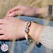 Beadle armband met zilveren en echte cowrie schelpjes