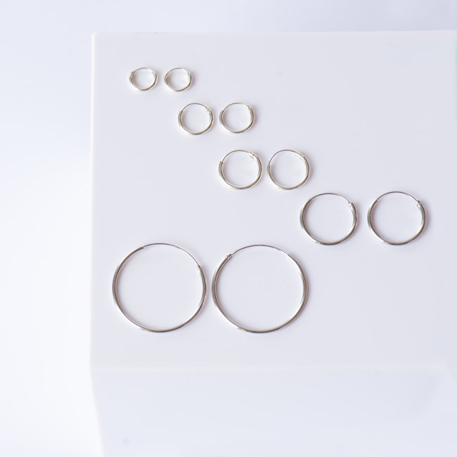 KARMA zilveren creool oorbellen