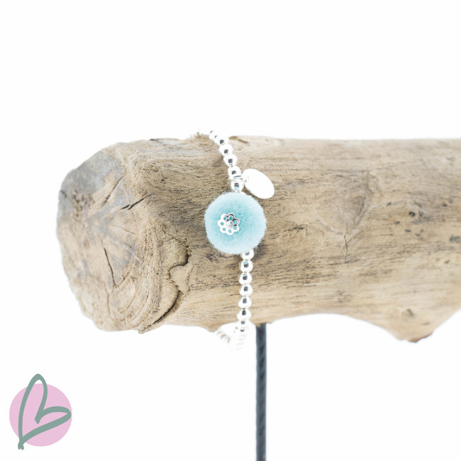 Biba Kralenarmband met aquablauwe pompom