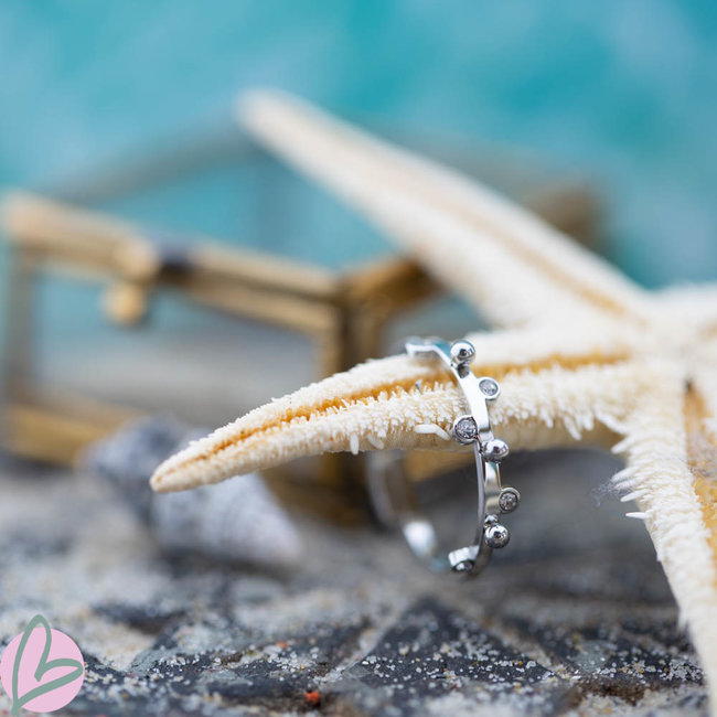 Zilver stalen ring met steentjes en bolletjes