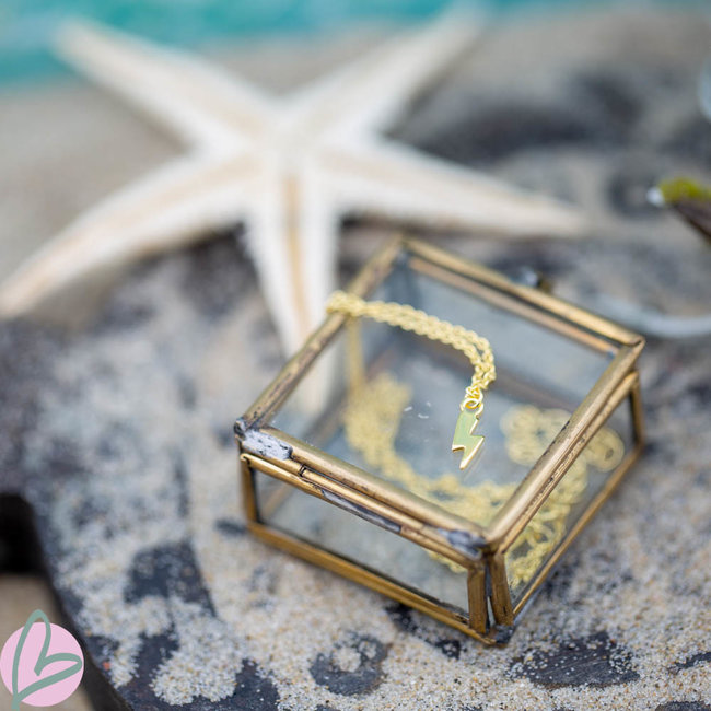 Goud ketting van Karma met bliksem