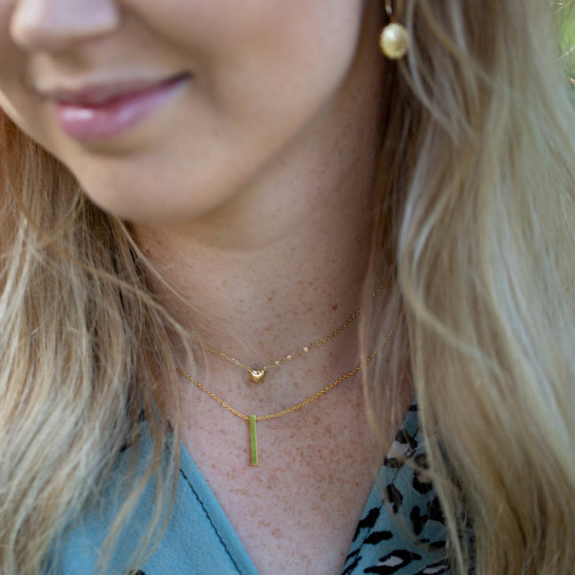Day & Eve  Stalen ketting met klein goud hartje