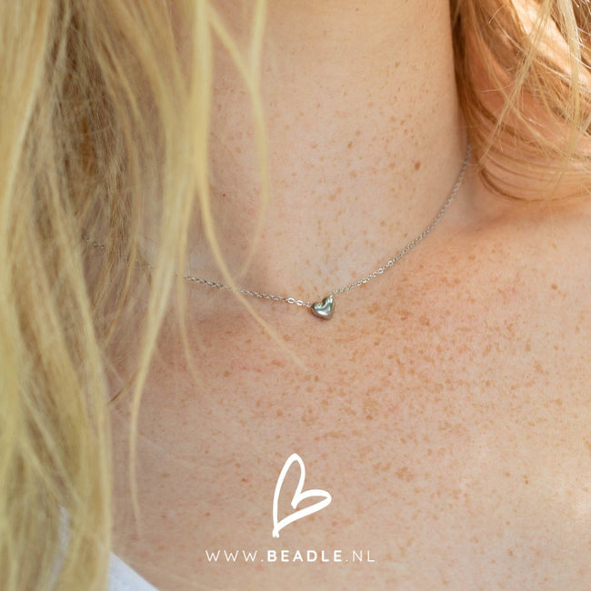 Stalen ketting met klein zilver hartje