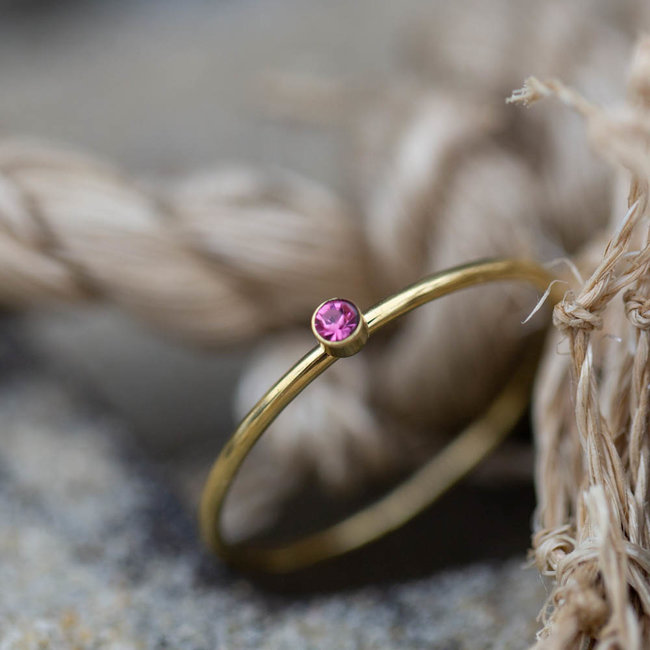 Charmins Ring goud roze steentje