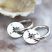 Day & Eve by Go Dutch Label Zilver oorringen met kompas