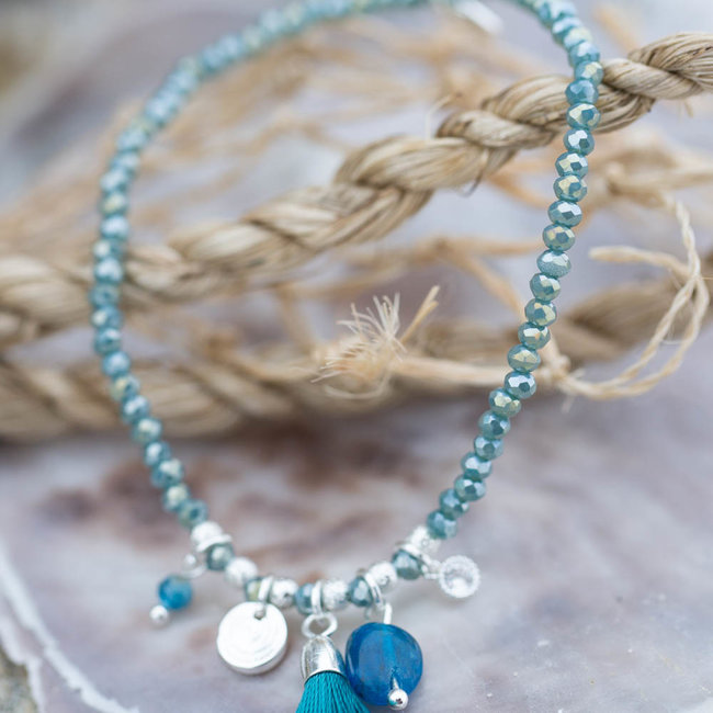 Biba Armband turquoise met kwastje en muntje