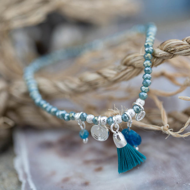 Biba Armband turquoise met kwastje en muntje
