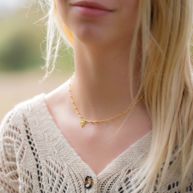 Karma ketting goud met balletjes en driehoekje