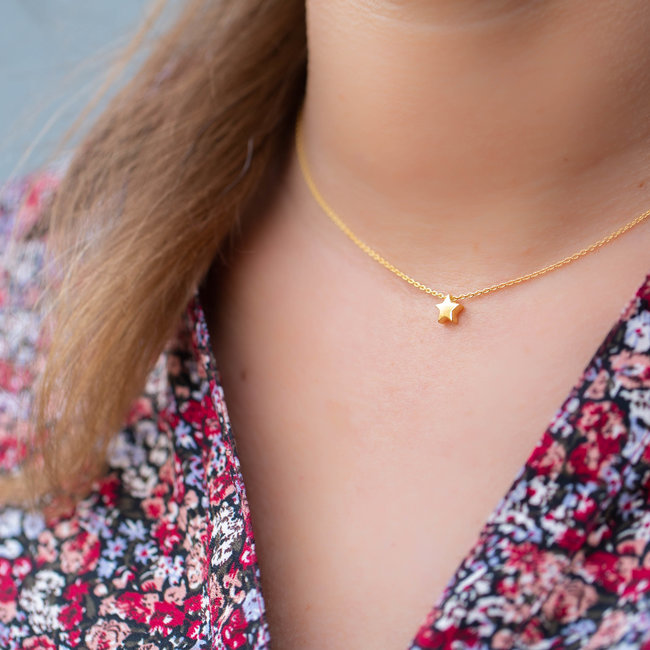 Goud ketting ster