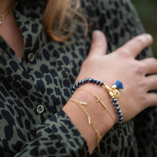 Biba Blauwe facet armband met kwast en muntje