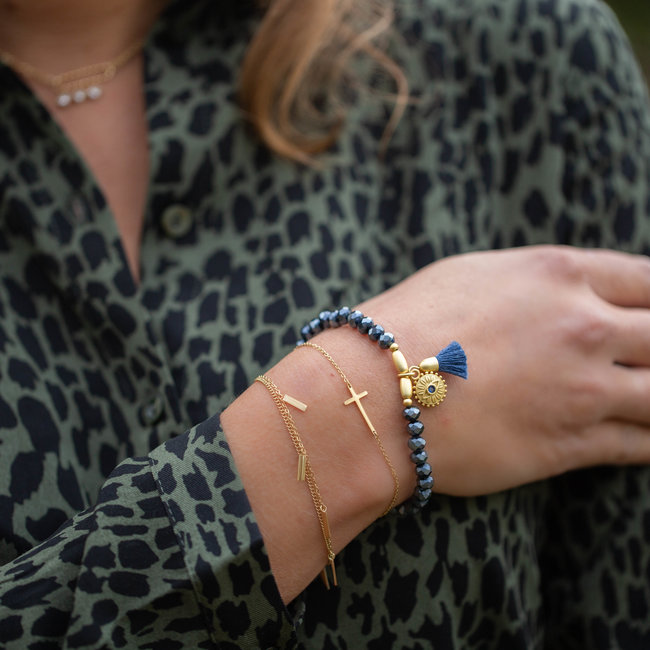 Biba Blauwe facet armband met kwast en muntje