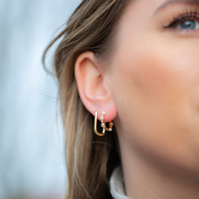 Goud oorbellen vierkant of met parels