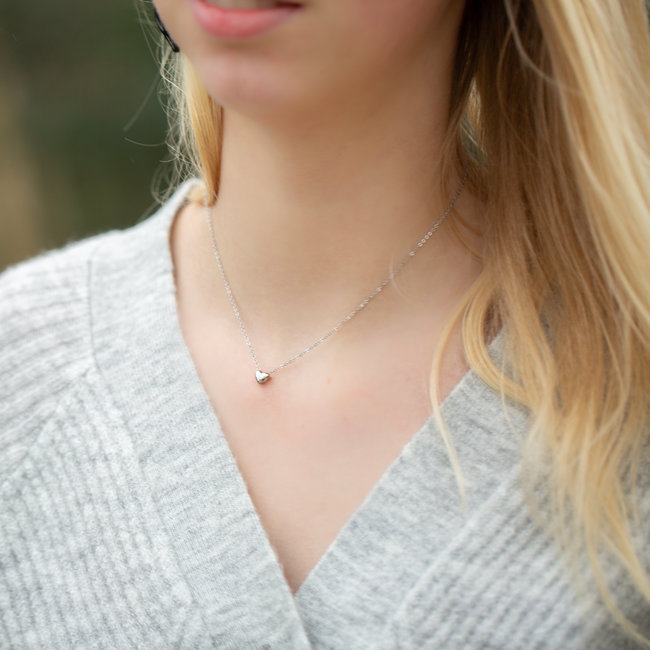 Stalen ketting met klein zilver hartje