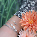 Day & Eve  Stoere zilver schakelarmband of parels en hart