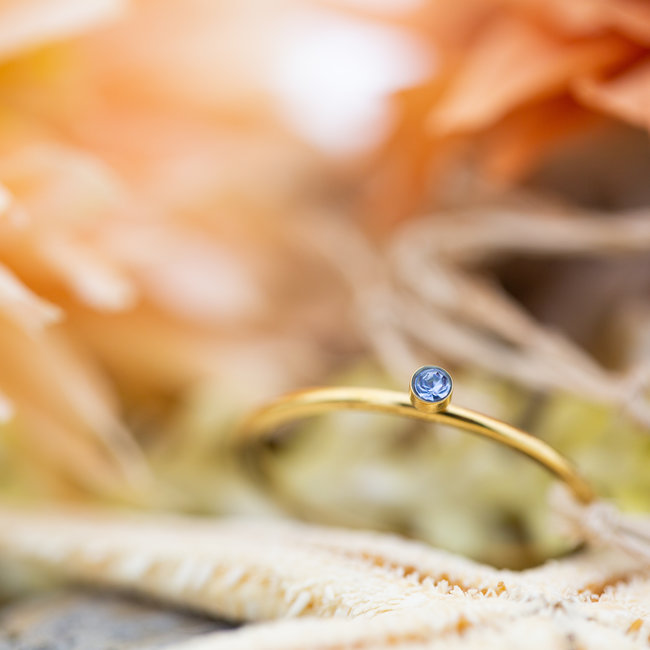 Vulring 1mm crystal goud  light saffire