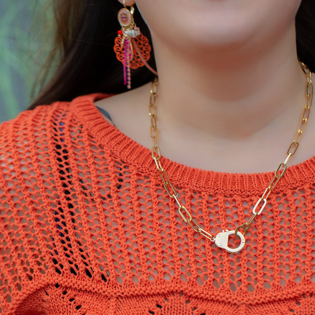 Goud schakelketting met handboei slot