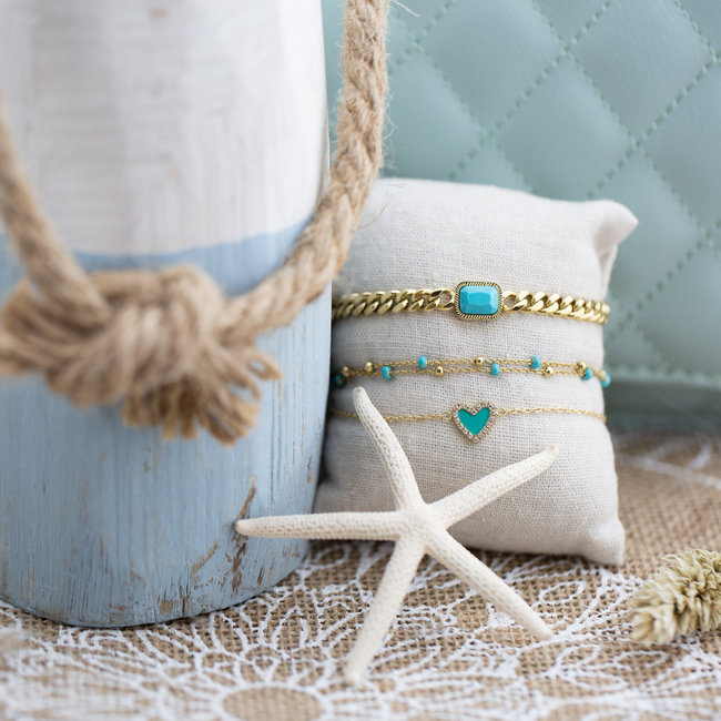 Gouden armband turquoise bedel en hartje