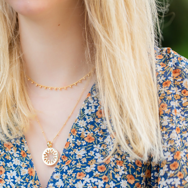 Dubbele ketting met balletjes en munt