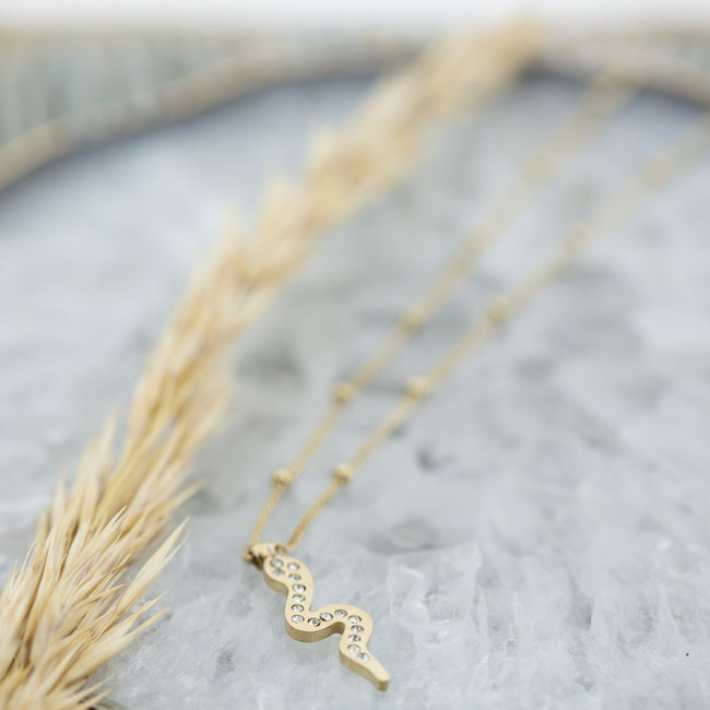Goudkleurige ketting met zirkonia slang