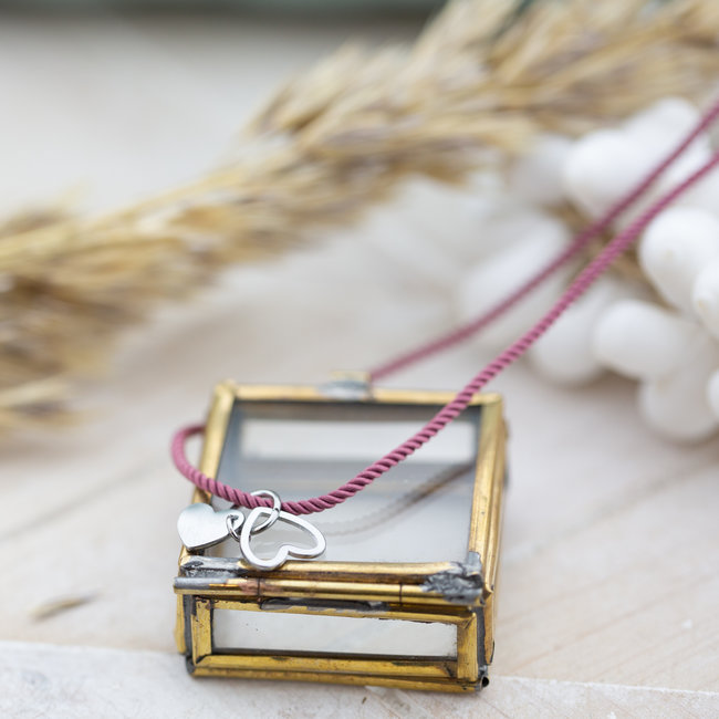 Day & Eve  Roze paars koord met hartjes van staal